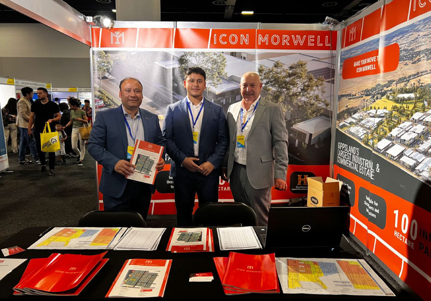 Three Homeington representatives at Australian Property Expo 2024 showcasing Icon Morwell